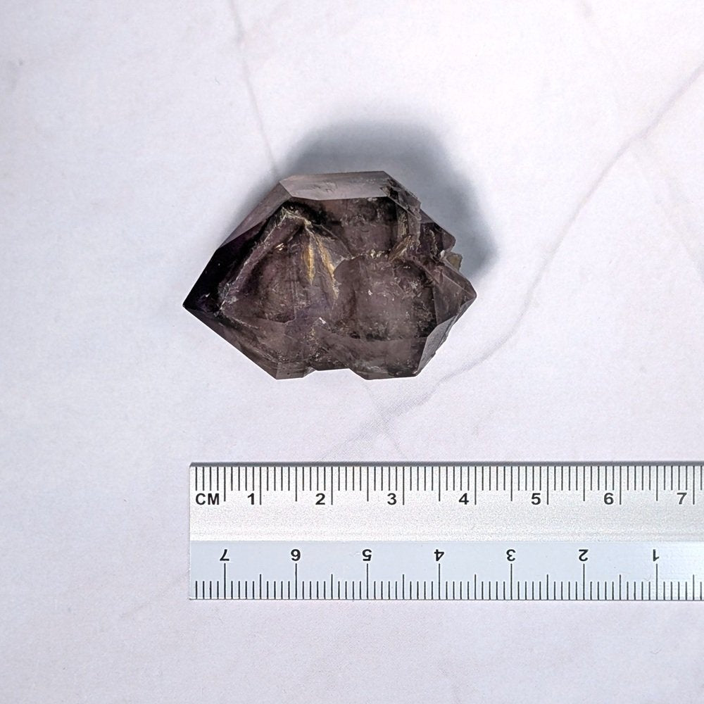 Rare améthyste Shangaan biterminée, avec une bulle d'eau (enhydro) et inclusions fines