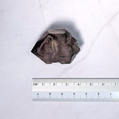 Rare améthyste Shangaan biterminée, avec une bulle d'eau (enhydro) et inclusions fines
